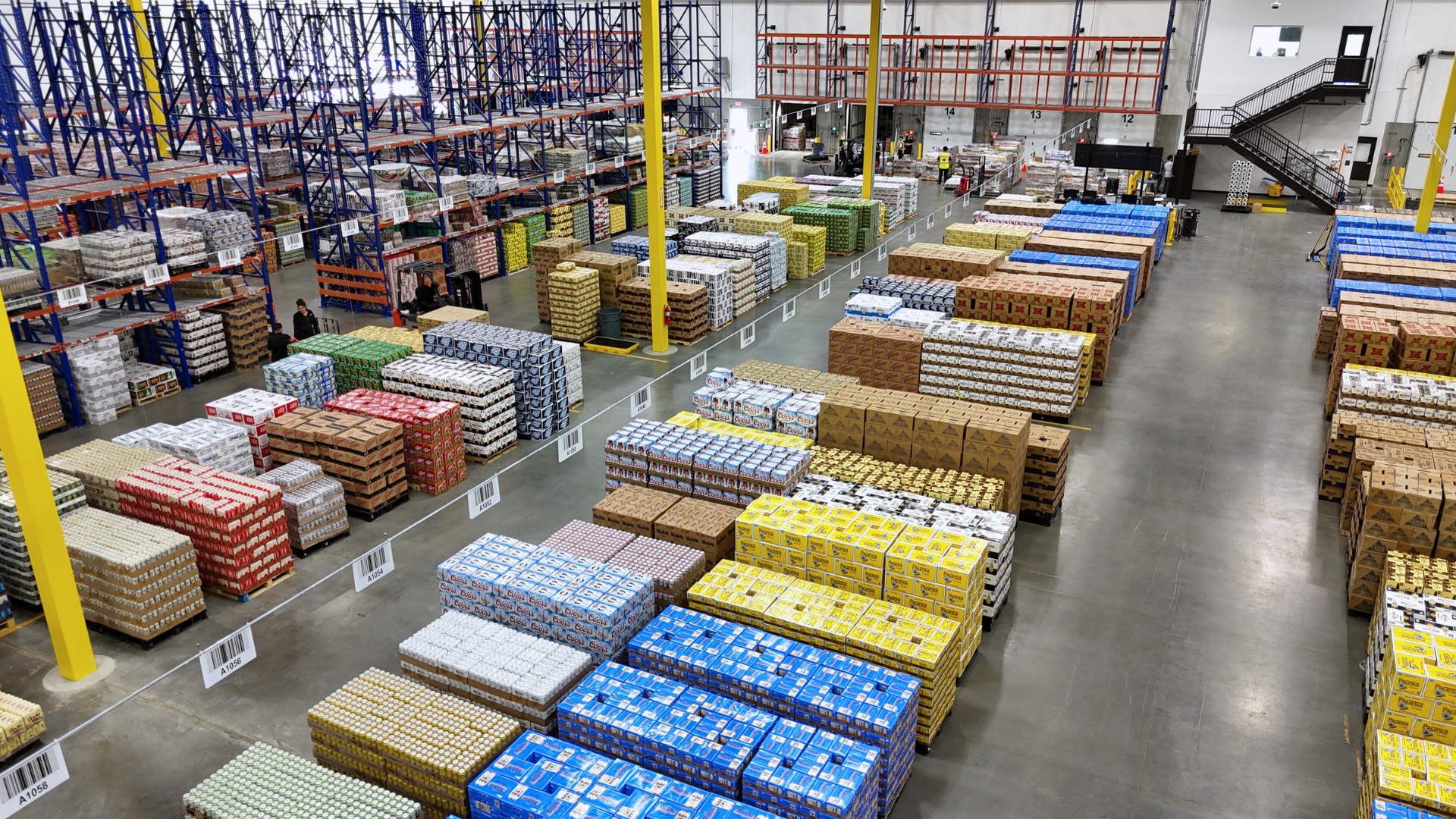 warehouse interior with pallets of beer cases