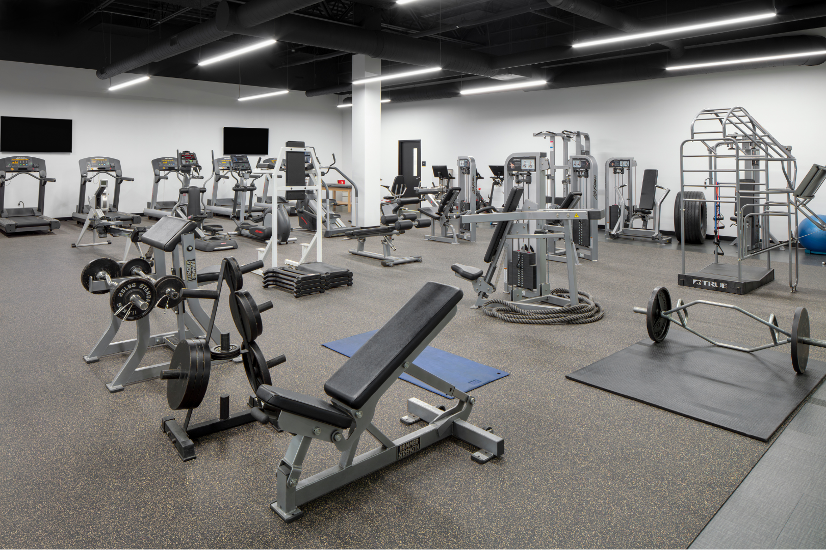 interior gym with workout equipment