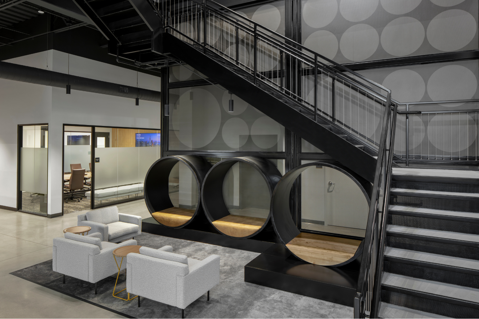 building interior with seating area and stairs